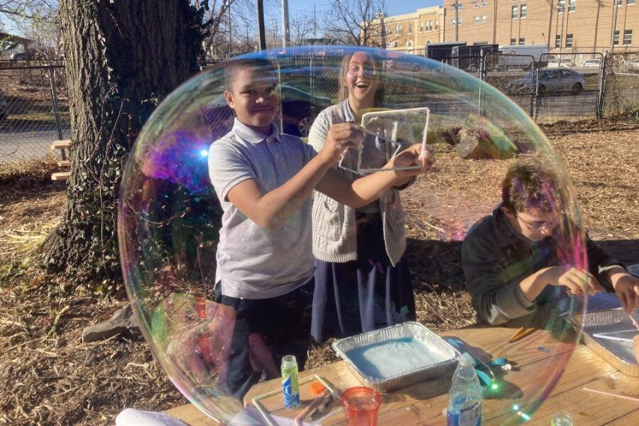 student making a huge bubble